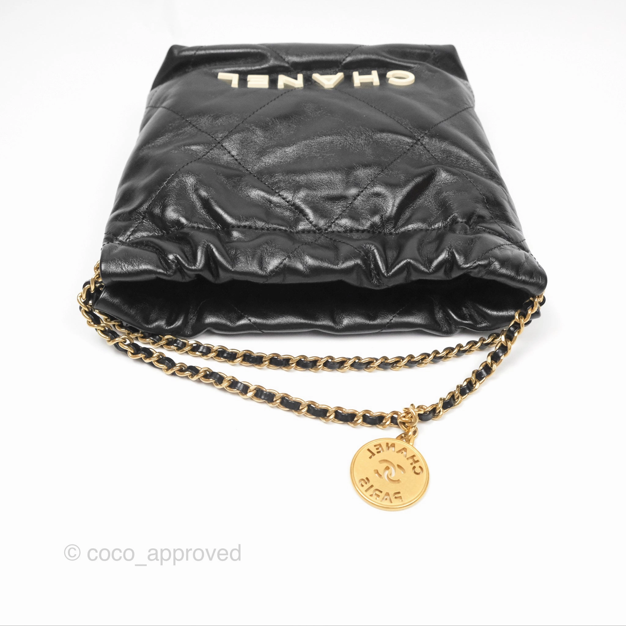 Chanel 22 Mini Bag Black Crumpled Calfskin White Lacquered Metal Logo