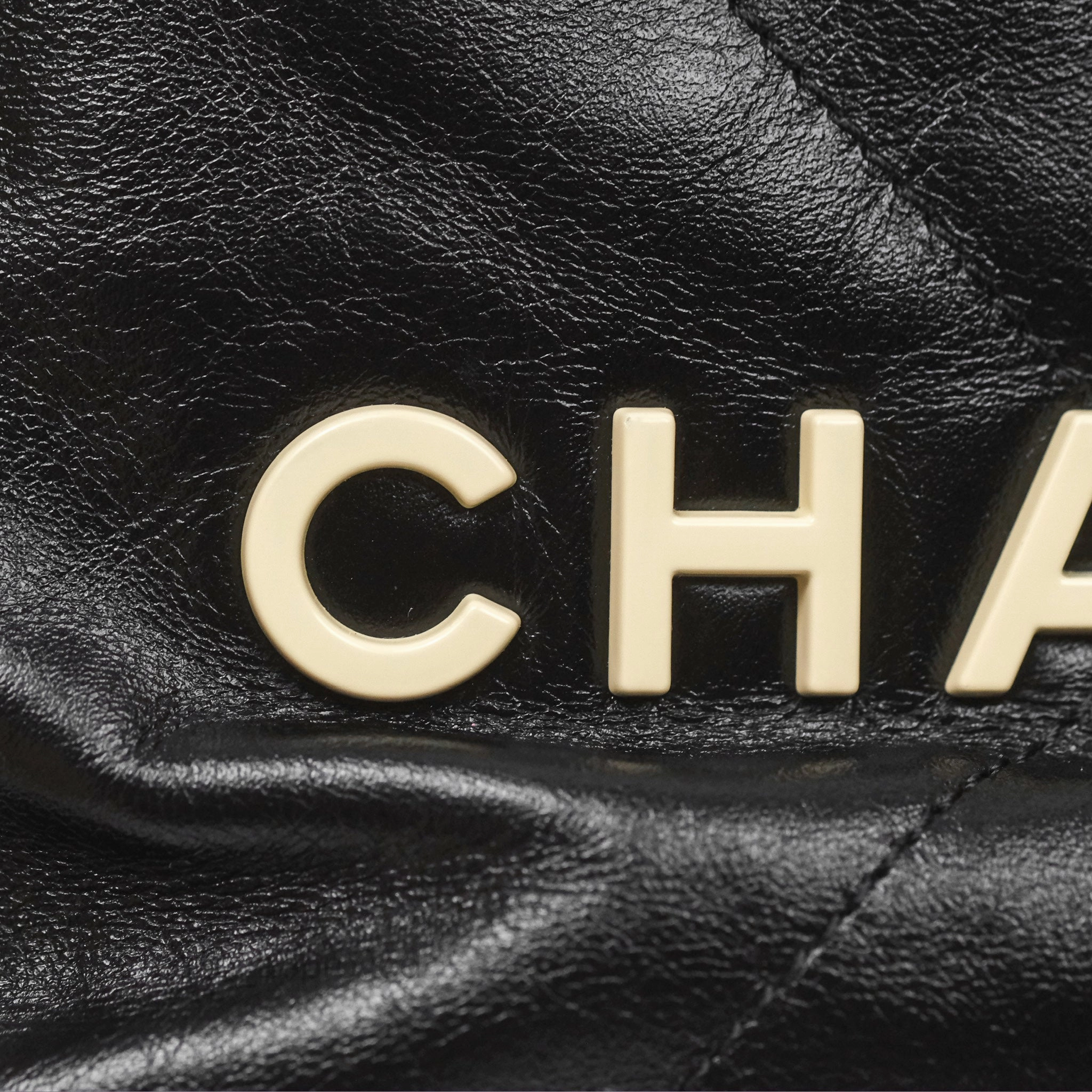 Chanel 22 Mini Bag Black Crumpled Calfskin White Lacquered Metal Logo