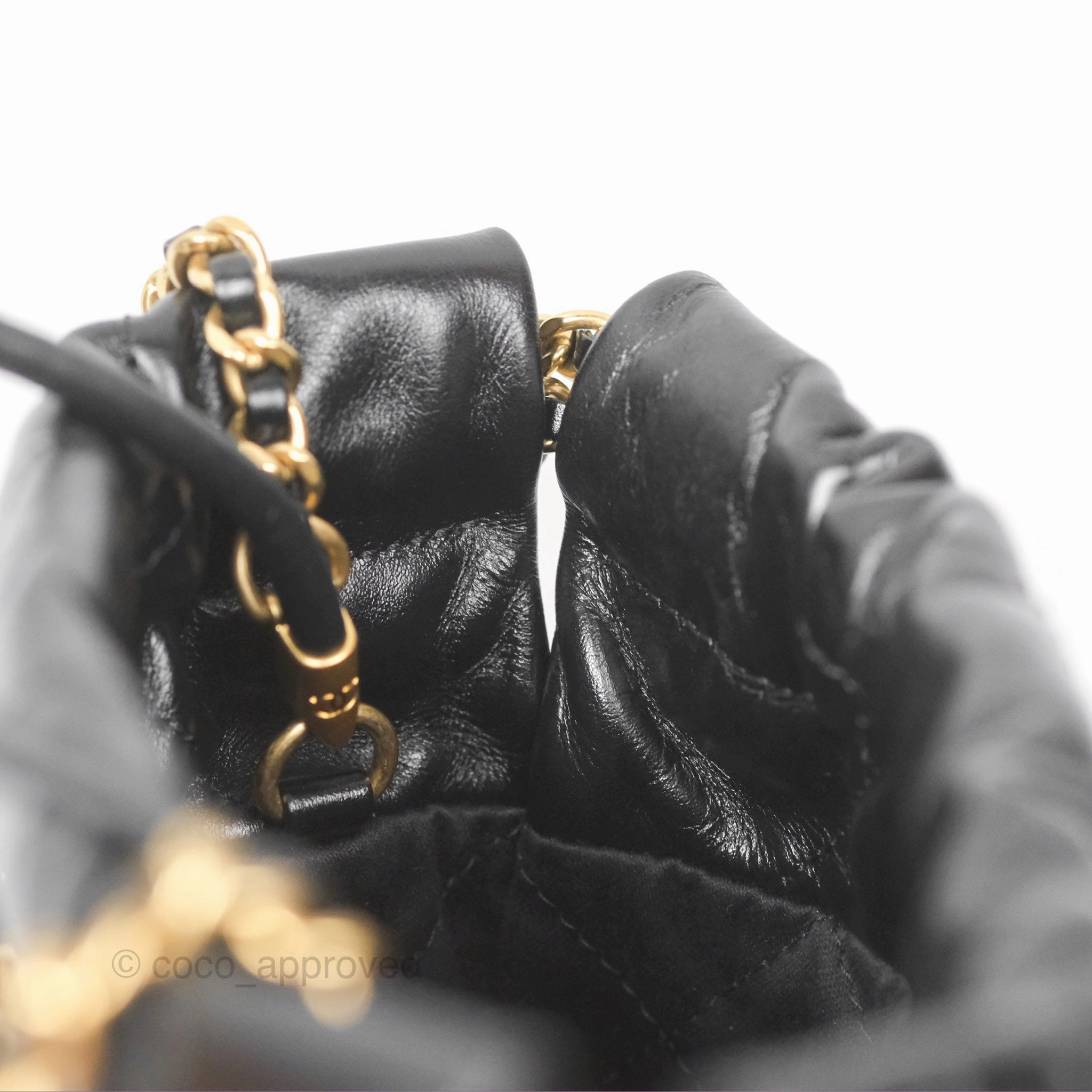 Chanel 22 Mini Bag Black Crumpled Calfskin White Lacquered Metal Logo