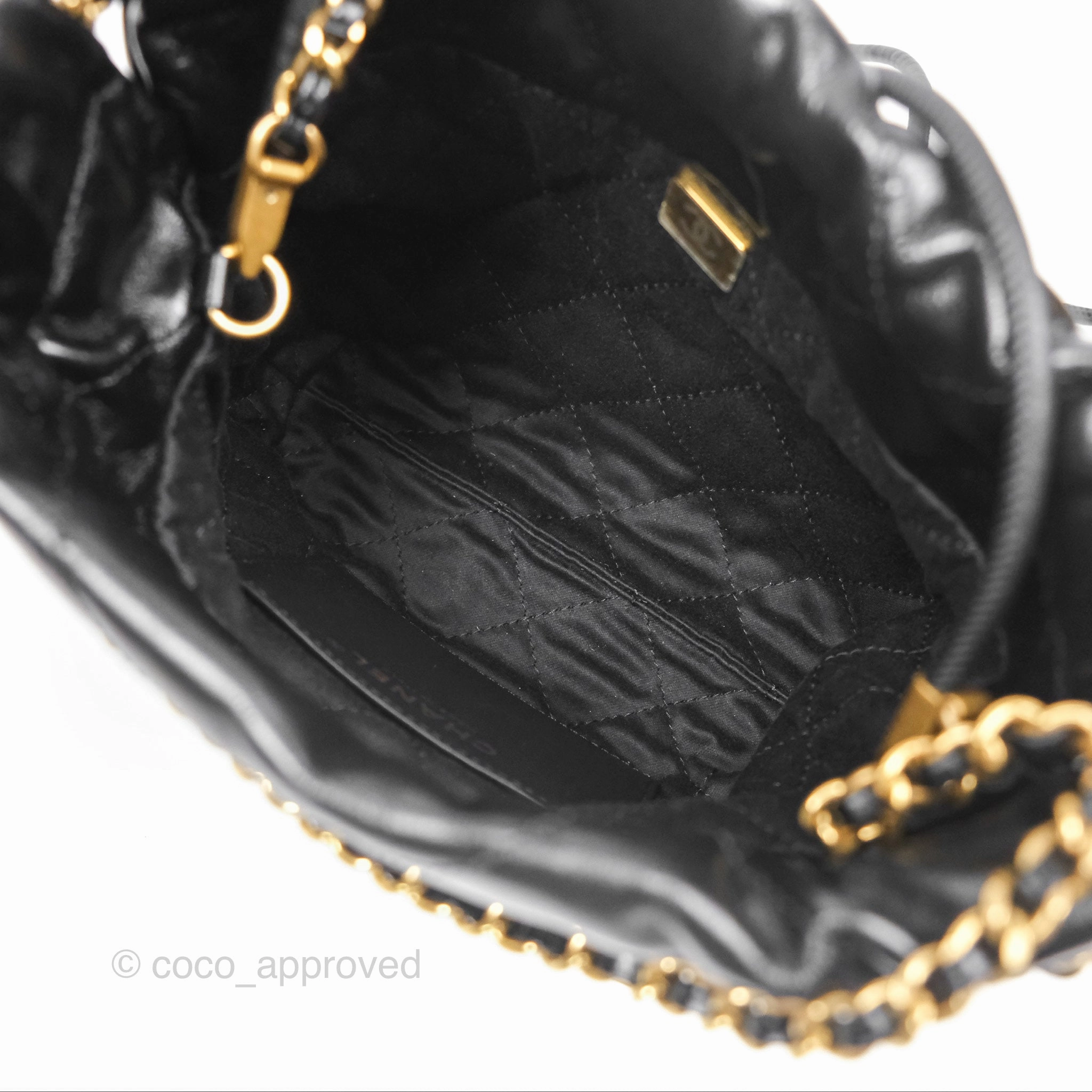 Chanel 22 Mini Bag Black Crumpled Calfskin White Lacquered Metal Logo