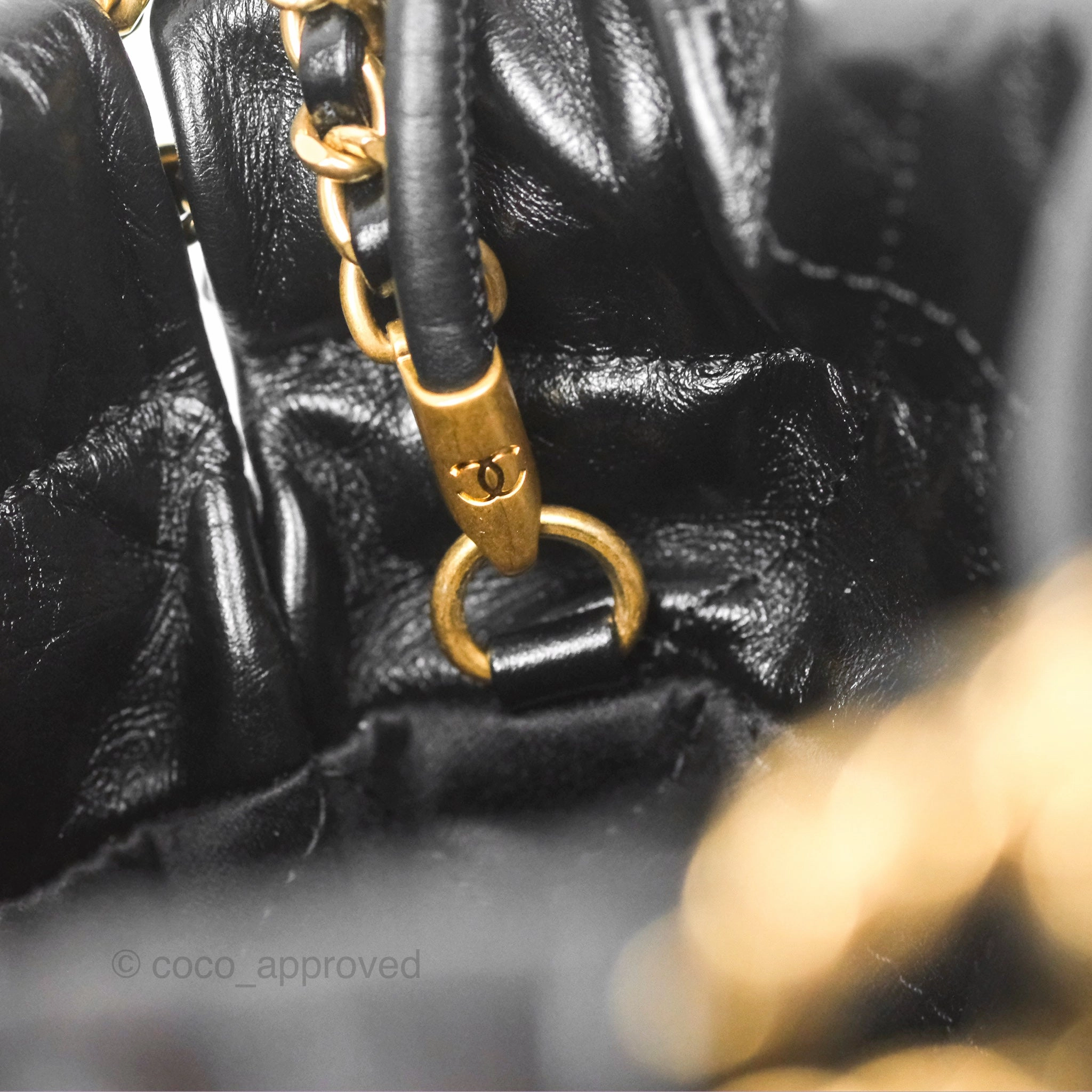 Chanel 22 Mini Bag Black Crumpled Calfskin White Lacquered Metal Logo