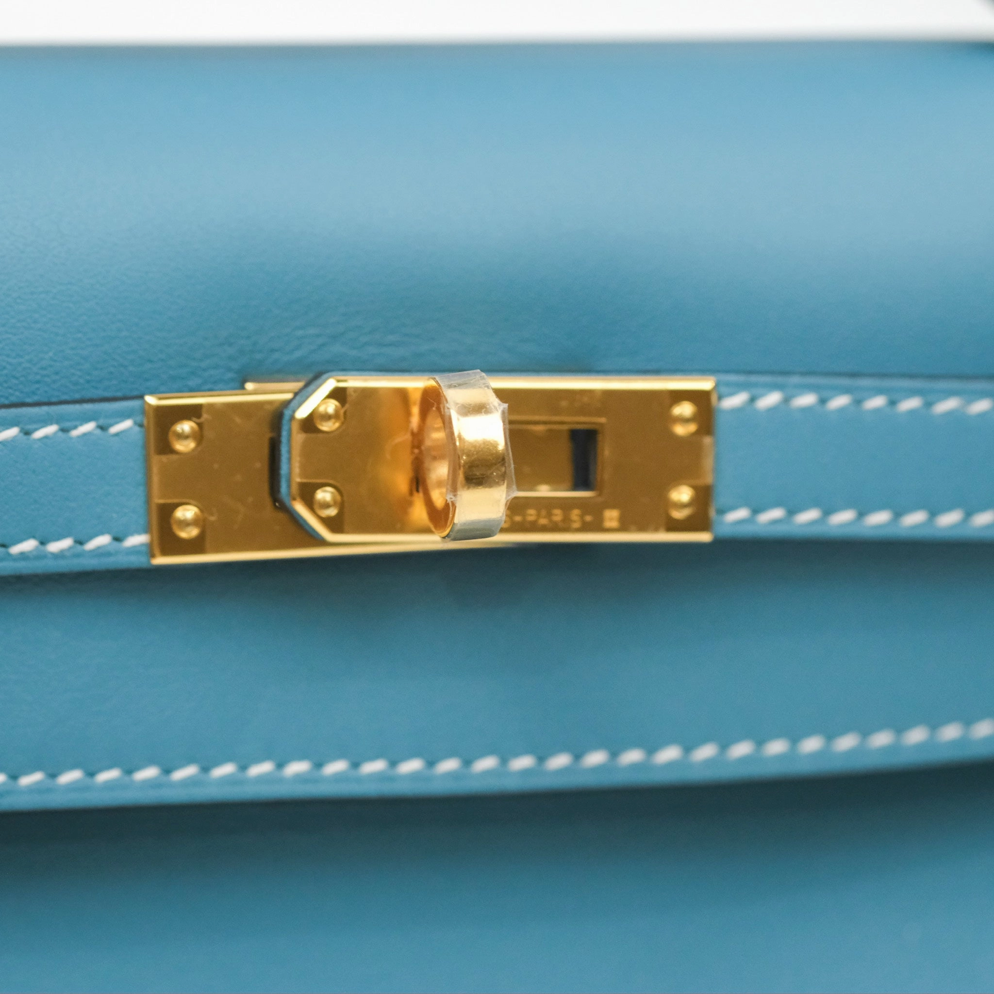 Herms Kelly Mini Pochette Bleu Jean Swift Gold Hardware