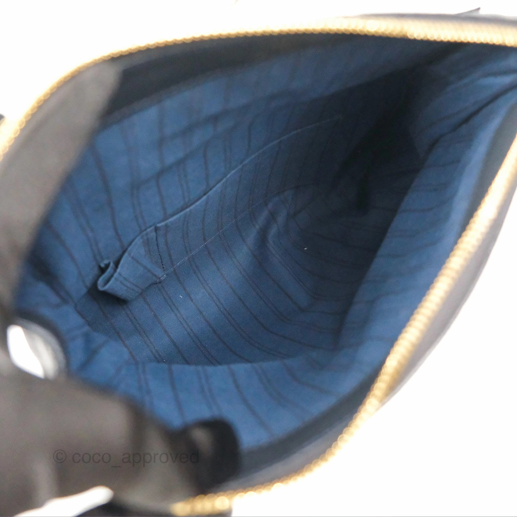 Louis Vuitton Petillante Clutch Empreinte Infini Navy