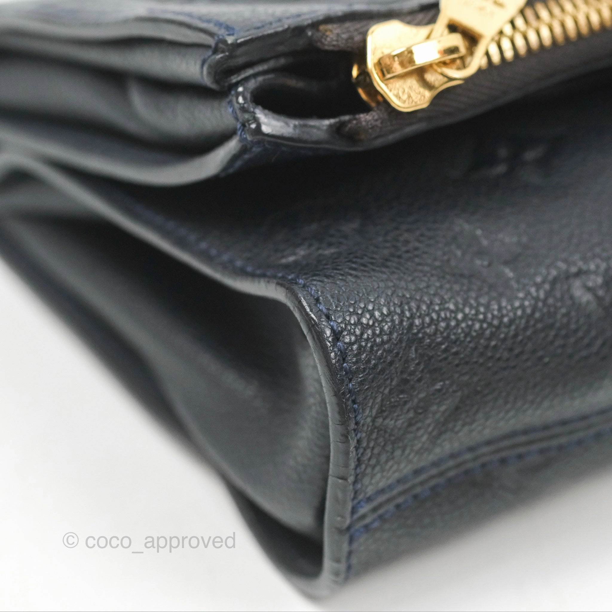 Louis Vuitton Petillante Clutch Empreinte Infini Navy