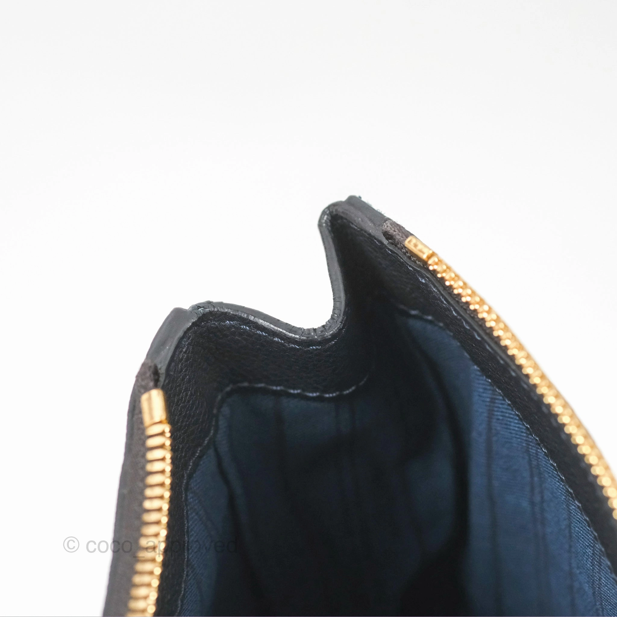 Louis Vuitton Petillante Clutch Empreinte Infini Navy