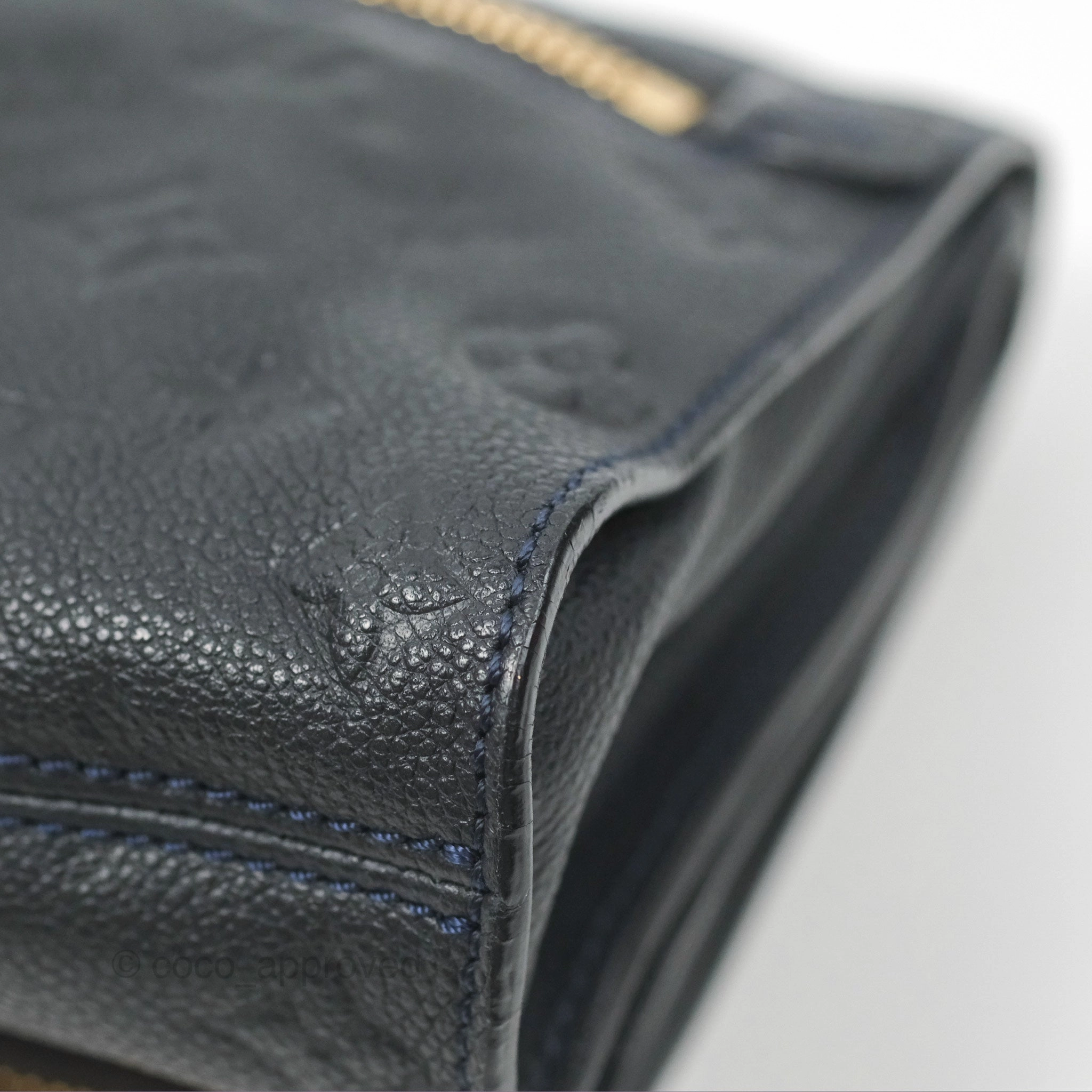 Louis Vuitton Petillante Clutch Empreinte Infini Navy