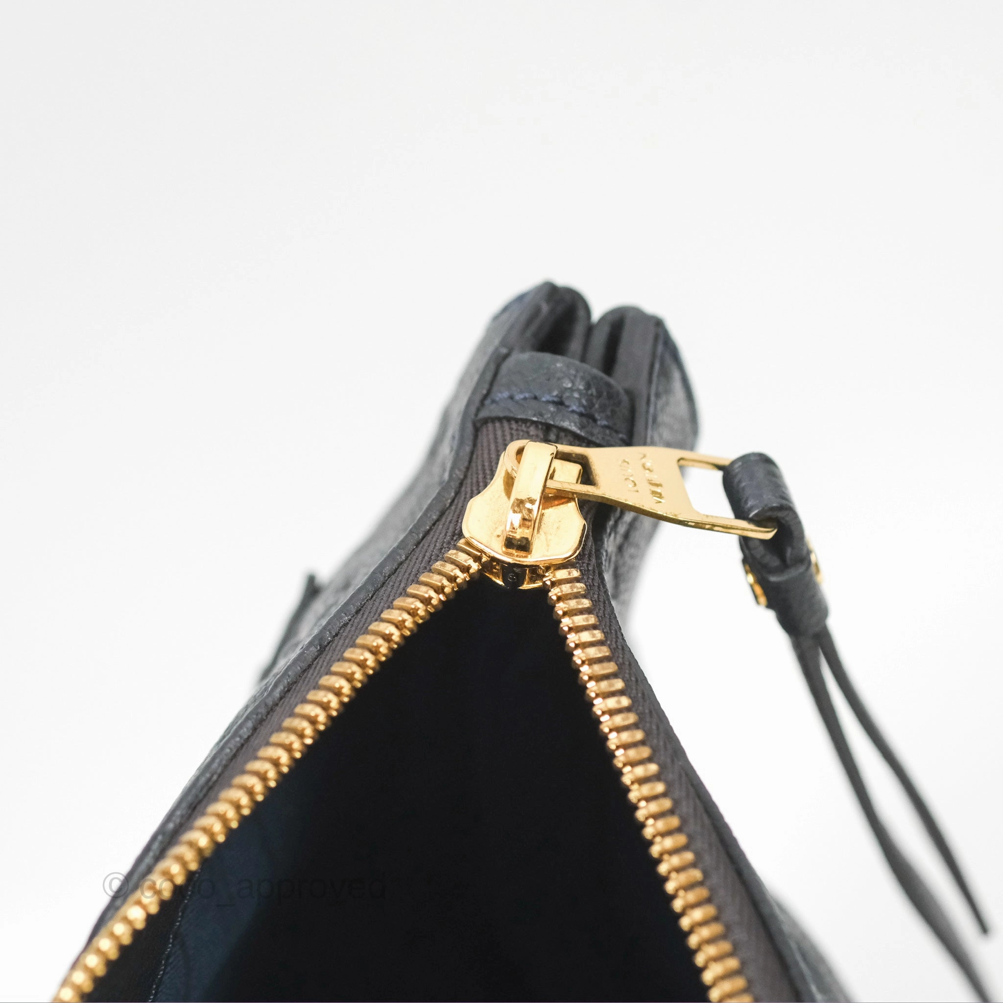 Louis Vuitton Petillante Clutch Empreinte Infini Navy