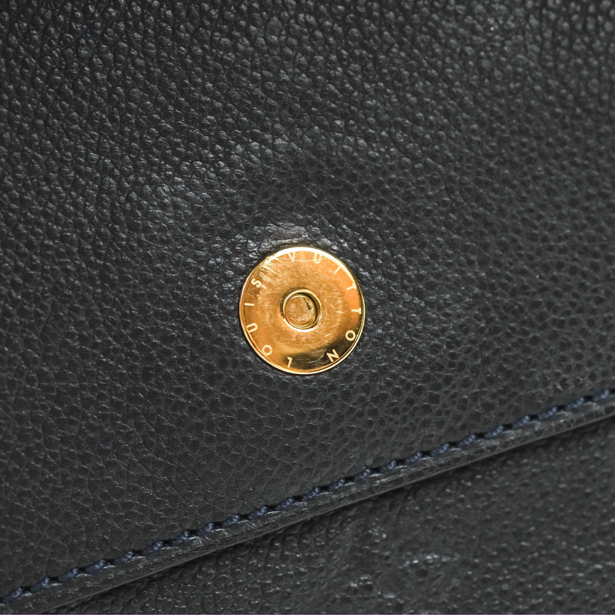 Louis Vuitton Petillante Clutch Empreinte Infini Navy