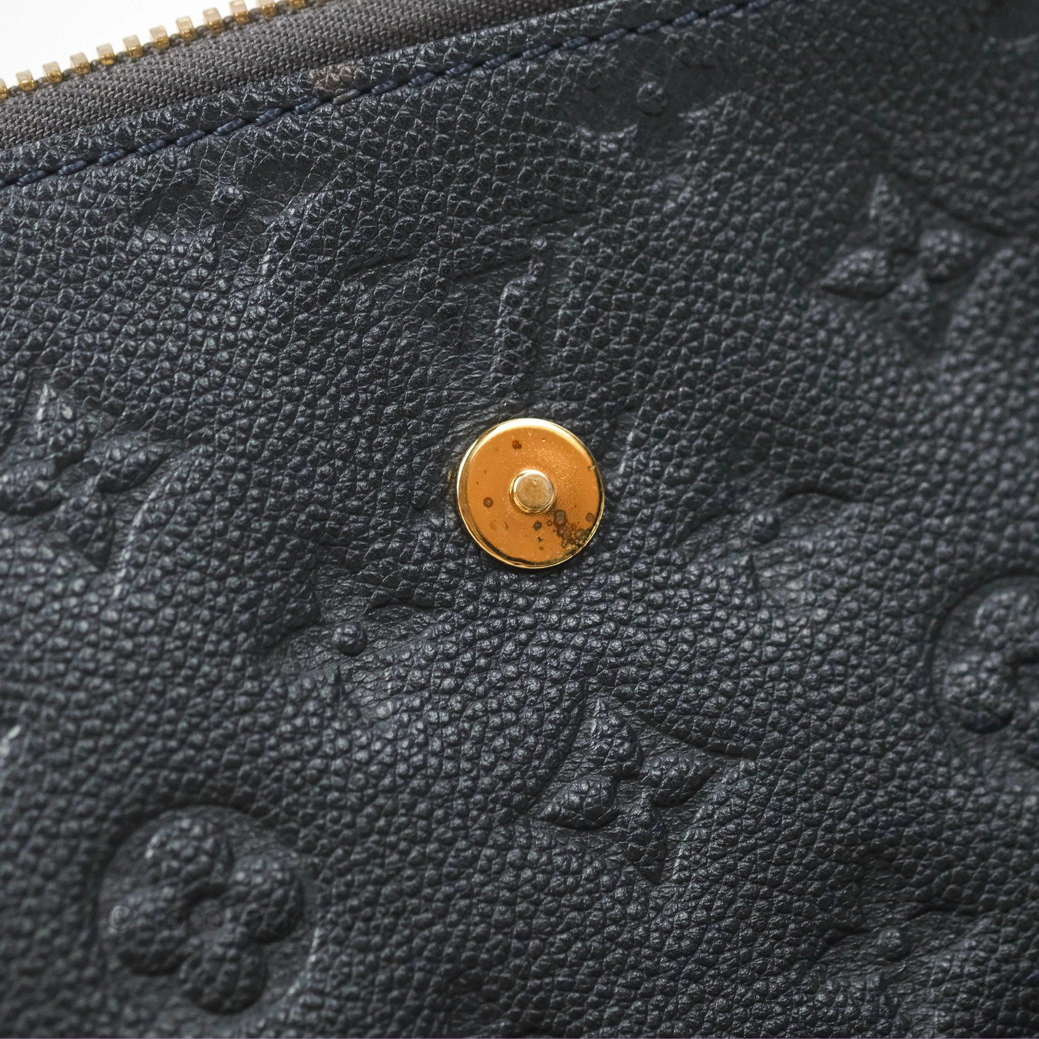 Louis Vuitton Petillante Clutch Empreinte Infini Navy